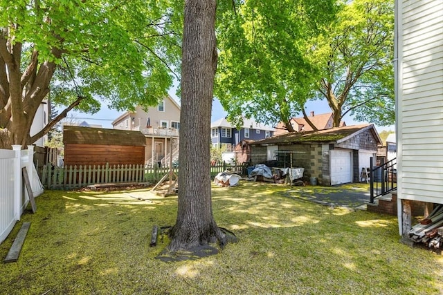 124 Grant Ave, Medford, MA 02155 - view of yard featuring an outbuilding and a detached garage