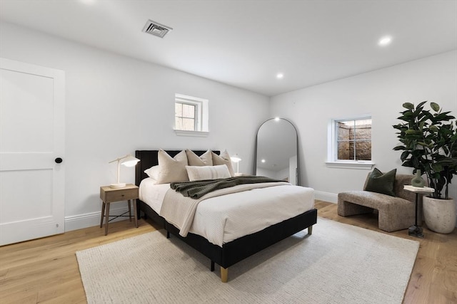 bedroom featuring light wood-type flooring