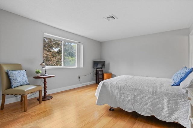 181 Littleton Rd Unit 333, Chelmsford, MA 01824 - bedroom with light wood-style floors and baseboards