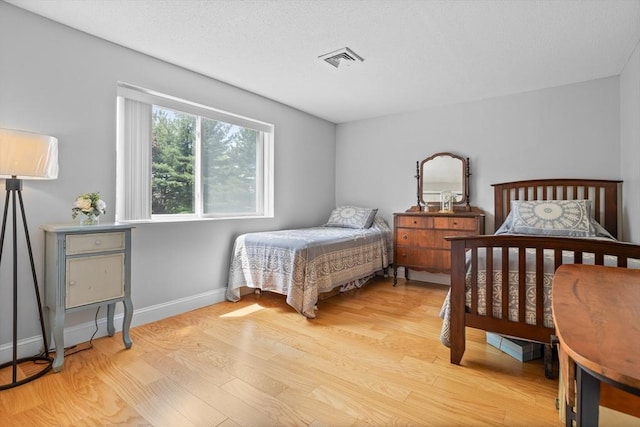 181 Littleton Rd Unit 333, Chelmsford, MA 01824 - bedroom featuring light wood finished floors and baseboards