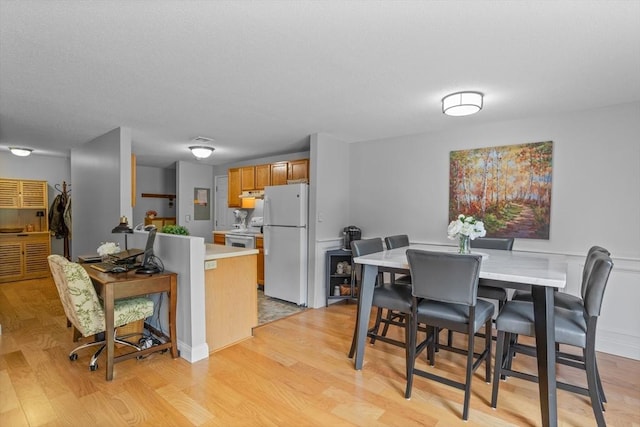 181 Littleton Rd Unit 333, Chelmsford, MA 01824 - dining area featuring light wood-style floors