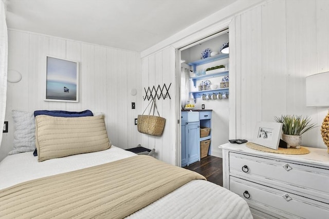 bedroom featuring dark wood-style floors