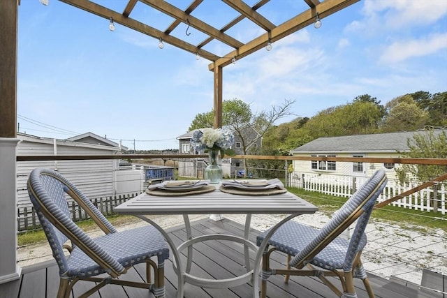wooden deck featuring a pergola