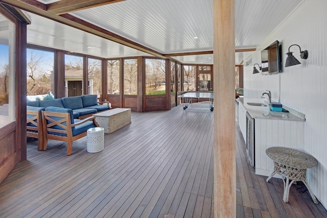 sunroom with sink