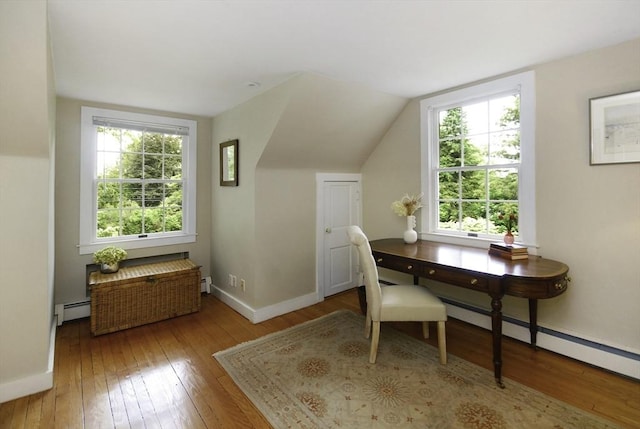 1074 Concord Rd, Sudbury, MA 01776 - office featuring baseboard heating, wood-type flooring, baseboards, a baseboard heating unit, and vaulted ceiling