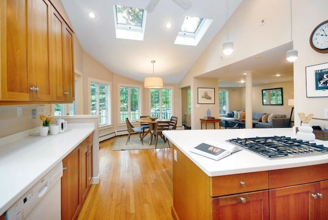 1074 Concord Rd, Sudbury, MA 01776 - kitchen featuring dishwasher, stainless steel gas cooktop, lofted ceiling, light wood-style floors, and brown cabinets