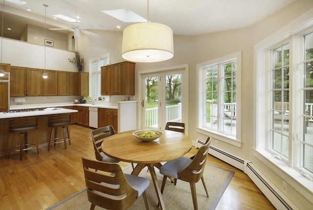 1074 Concord Rd, Sudbury, MA 01776 - dining area featuring light wood-type flooring, a high ceiling, recessed lighting, and a ceiling fan