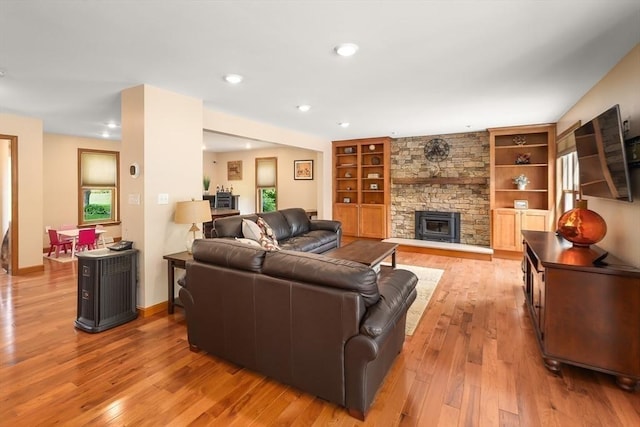 16 Blueberry Way, Webster, MA 01570 - living room featuring a fireplace, light wood-style flooring, built in features, and recessed lighting