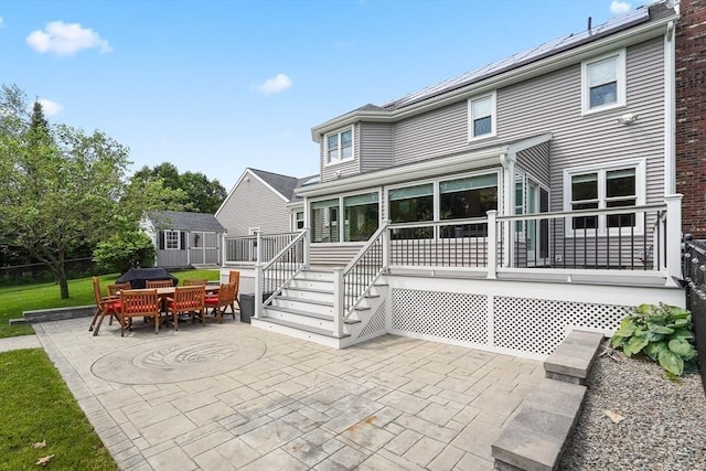16 Blueberry Way, Webster, MA 01570 - back of house with a patio area, outdoor dining area, and a shed