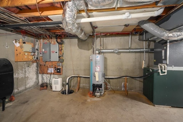 16 Blueberry Way, Webster, MA 01570 - unfinished below grade area with electric water heater, electric panel, oil tank, and heating unit