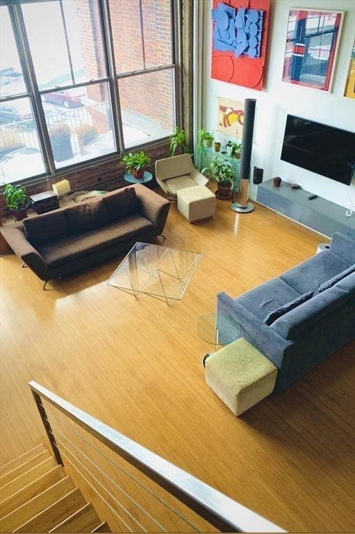 living room with wood finished floors