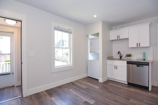 22 Chester Unit 22, Amesbury, MA 01913 - kitchen featuring dishwasher, stacked washer / dryer, a sink, light stone countertops, and recessed lighting
