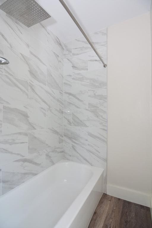 22 Chester Unit 22, Amesbury, MA 01913 - bathroom with wood finished floors, shower / washtub combination, and baseboards