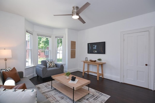 22 Chester Unit 22, Amesbury, MA 01913 - living area with baseboards, dark wood-style floors, and ceiling fan