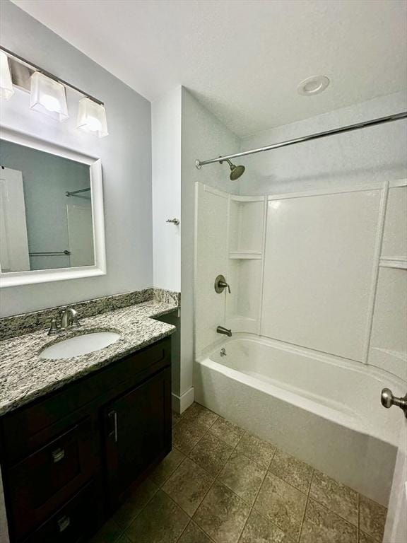 full bath featuring bathtub / shower combination and vanity