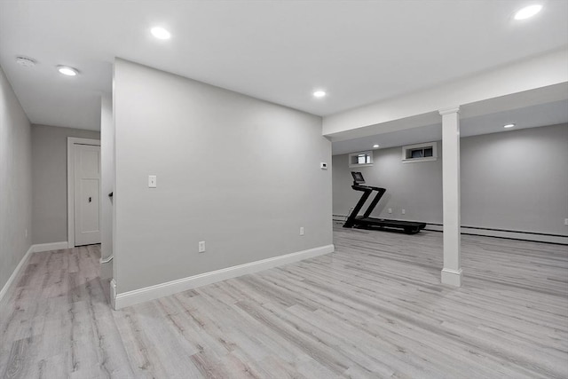 basement featuring light hardwood / wood-style flooring