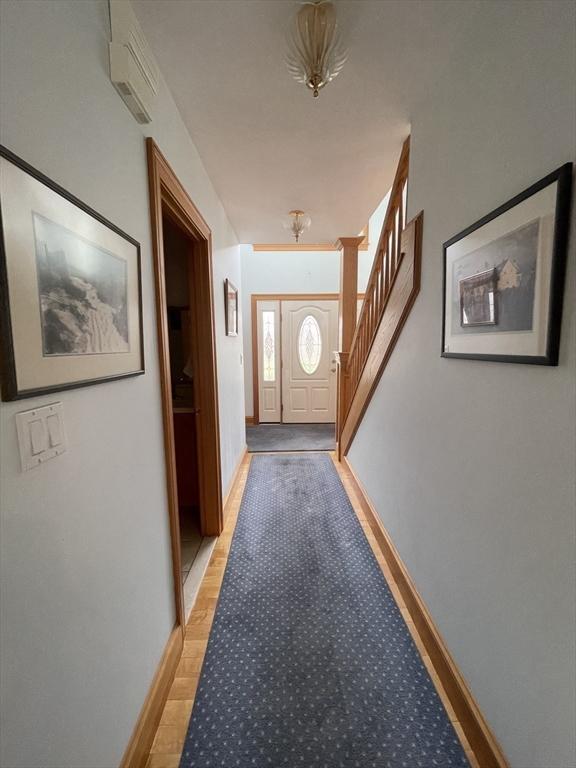 26 Feeney Rd, Norwood, MA 02062 - entryway with baseboards and light wood-type flooring