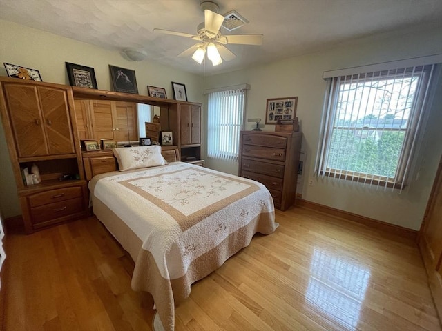 26 Feeney Rd, Norwood, MA 02062 - bedroom with light wood finished floors, baseboards, and ceiling fan