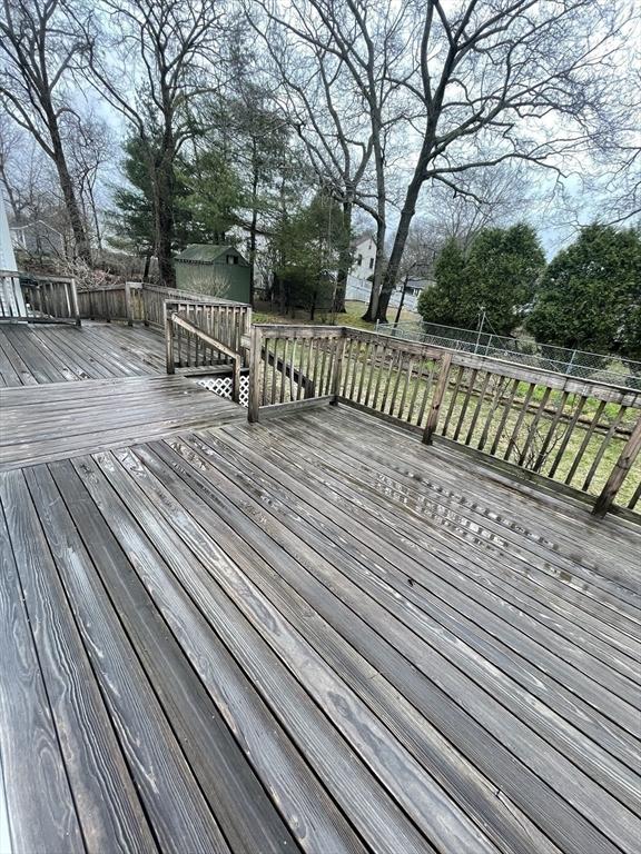 26 Feeney Rd, Norwood, MA 02062 - wooden deck with a fenced backyard