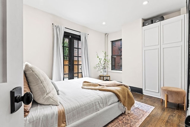 bedroom featuring dark hardwood / wood-style floors