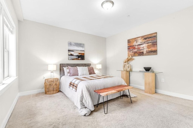 321 Hammond Pond Pkwy Unit 103, Brookline, MA 02467 - bedroom with carpet floors and baseboards