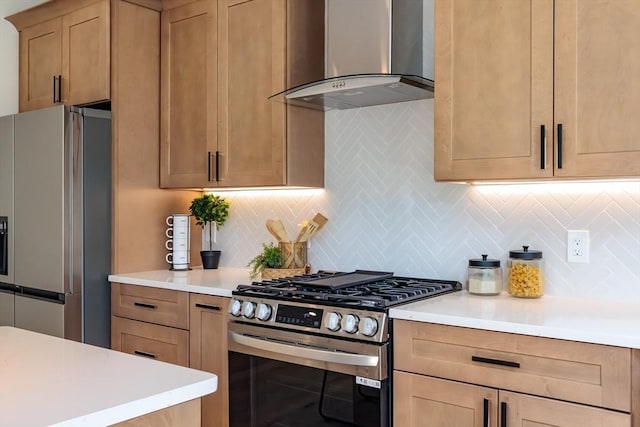 59 Dartmouth St Unit A, Somerville, MA 02145 - kitchen featuring wall chimney range hood, stainless steel appliances, light countertops, and tasteful backsplash