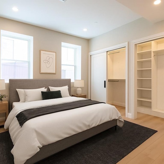59 Dartmouth St Unit A, Somerville, MA 02145 - bedroom with light wood finished floors and recessed lighting