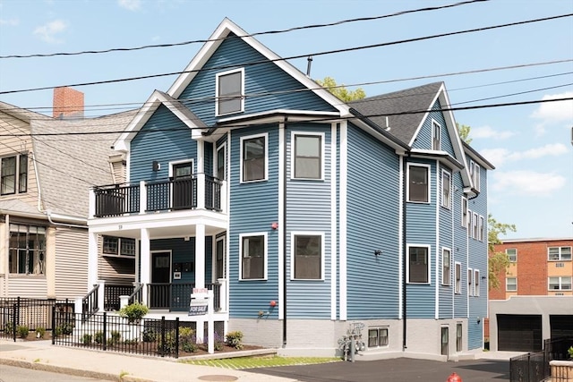 59 Dartmouth St Unit A, Somerville, MA 02145 - view of front of house featuring a porch and a balcony