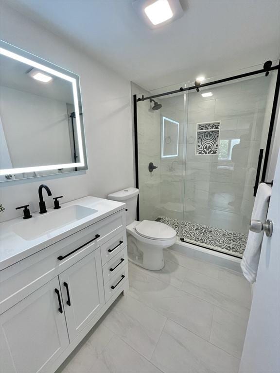 180 Green St Unit 415, Melrose, MA 02176 - bathroom with marble finish flooring, a shower stall, and vanity