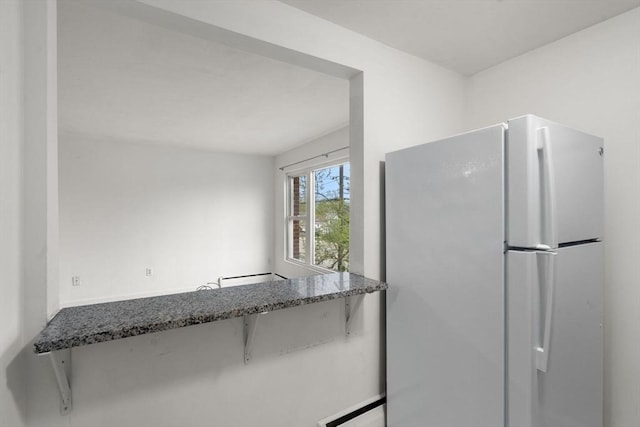 150 Main St Unit 12, Stoneham, MA 02180 - kitchen featuring freestanding refrigerator