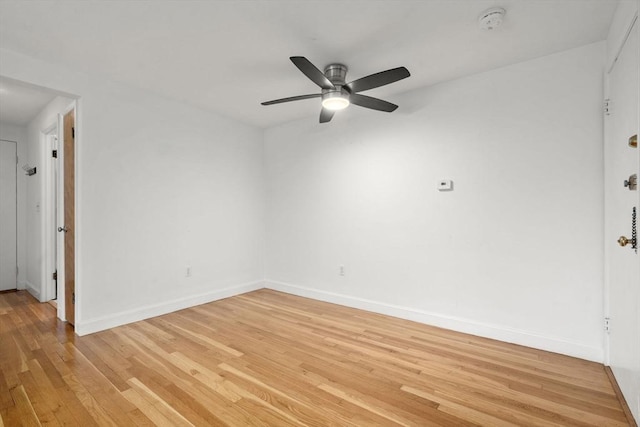 150 Main St Unit 12, Stoneham, MA 02180 - spare room with a ceiling fan, light wood-style floors, and baseboards