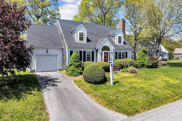 72 Rosemary Ln, Barnstable, MA 02632 - cape cod-style house with a garage, a chimney, driveway, a front lawn, and roof with shingles