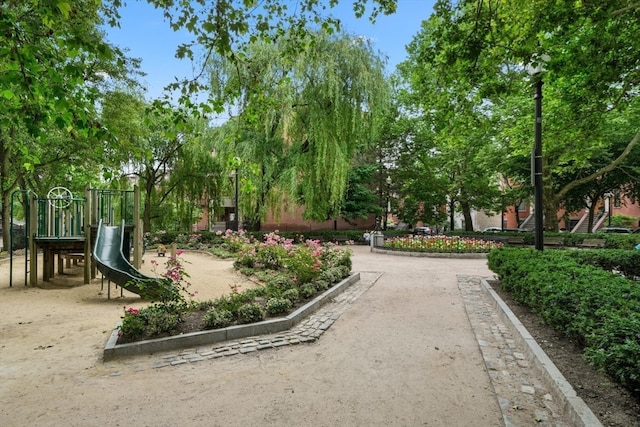 view of community with a playground