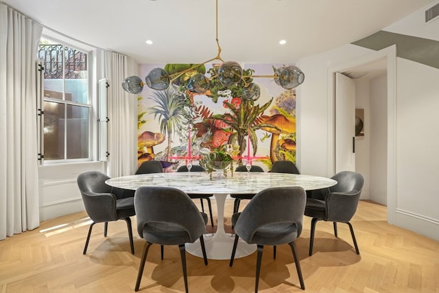 dining room featuring light parquet flooring