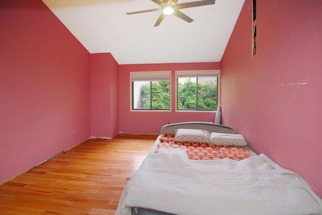 238 Brown Bear Xing Unit 238, Acton, MA 01720 - bedroom with light wood-style floors, vaulted ceiling, and a ceiling fan