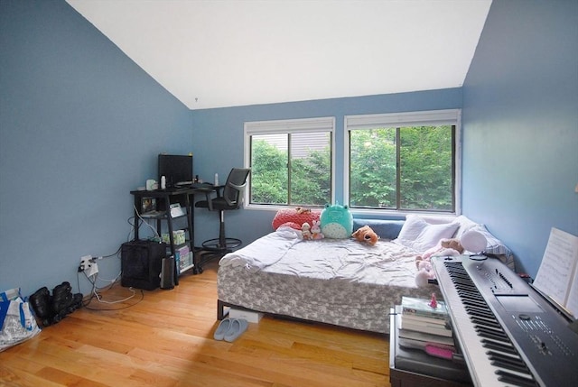 238 Brown Bear Xing Unit 238, Acton, MA 01720 - bedroom featuring lofted ceiling and wood finished floors