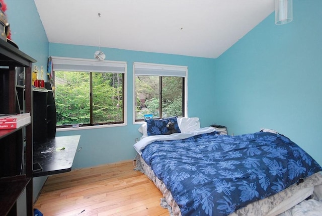 238 Brown Bear Xing Unit 238, Acton, MA 01720 - bedroom with lofted ceiling and wood finished floors