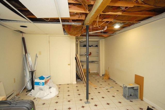 238 Brown Bear Xing Unit 238, Acton, MA 01720 - finished basement with light floors and a baseboard heating unit