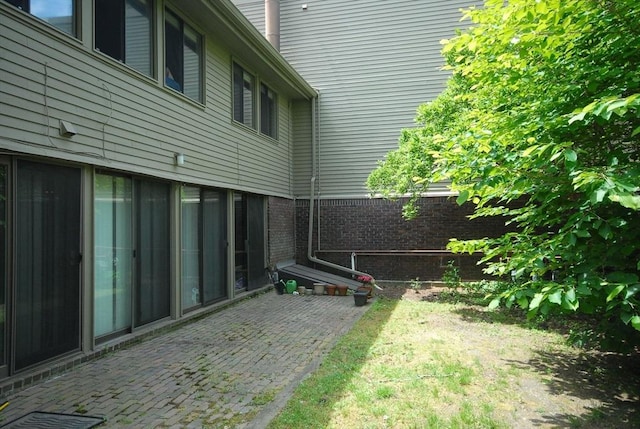 238 Brown Bear Xing Unit 238, Acton, MA 01720 - view of yard with a patio area