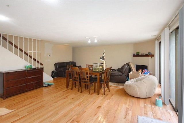 238 Brown Bear Xing Unit 238, Acton, MA 01720 - dining space with light wood-style flooring and stairway