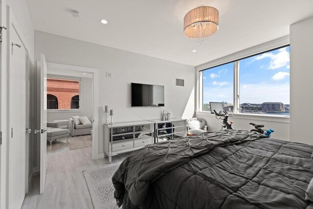 234 Causeway St Apt 709, Boston, MA 02114 - bedroom with recessed lighting, wood finished floors, and visible vents