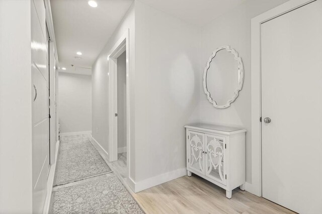 234 Causeway St Apt 709, Boston, MA 02114 - corridor featuring recessed lighting, baseboards, and light wood finished floors