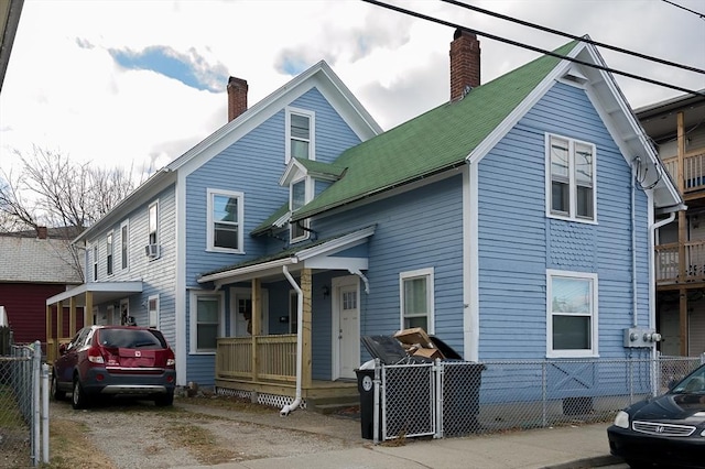 view of front of home featuring covered porch