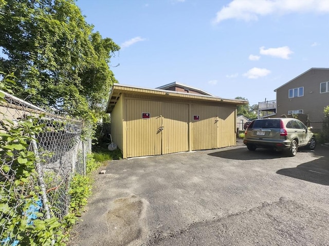 16 Willoughby St, Lawrence, MA 01841 - view of property exterior with an outbuilding
