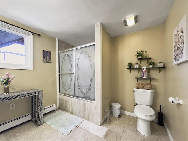16 Willoughby St, Lawrence, MA 01841 - bathroom featuring toilet, shower / bath combination with glass door, tile patterned floors, and baseboard heating
