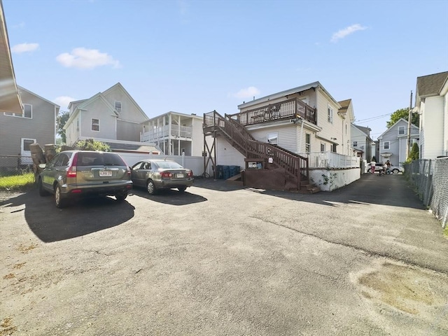 16 Willoughby St, Lawrence, MA 01841 - view of asphalt road with a residential view and stairway