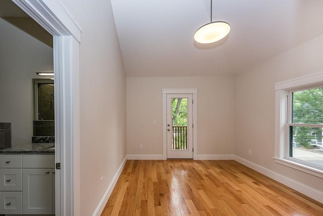 doorway to outside with light hardwood / wood-style flooring