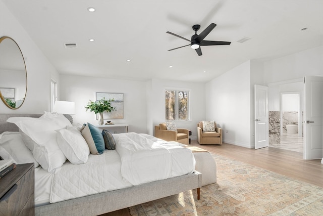 bedroom with light wood-type flooring, ensuite bath, and ceiling fan