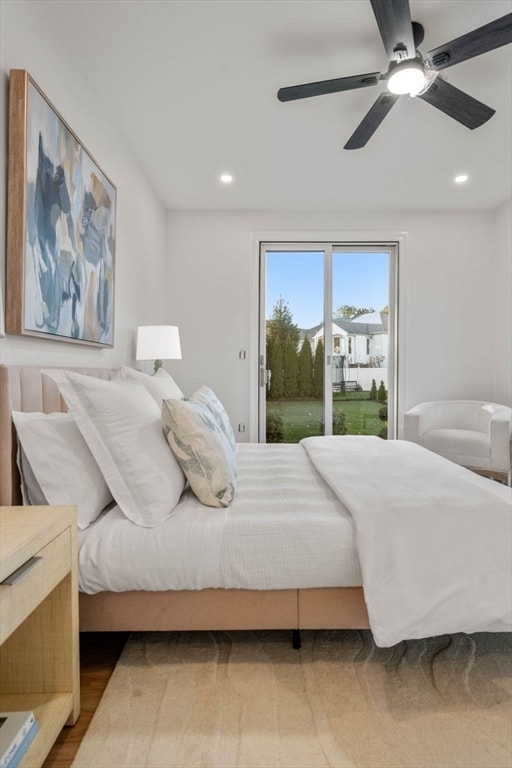 bedroom with ceiling fan and access to exterior