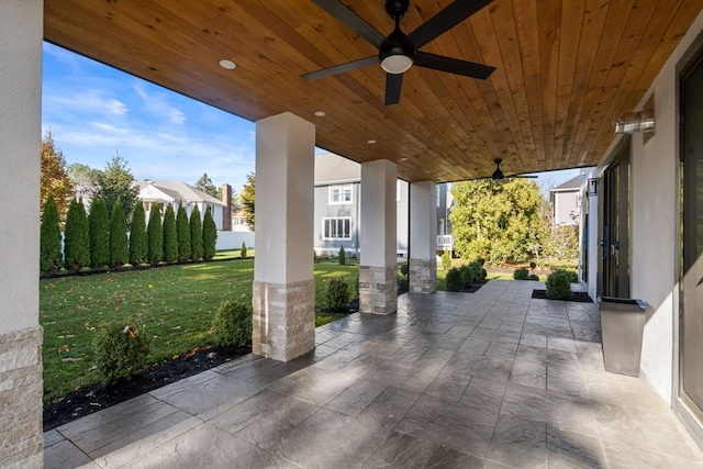 view of patio featuring ceiling fan